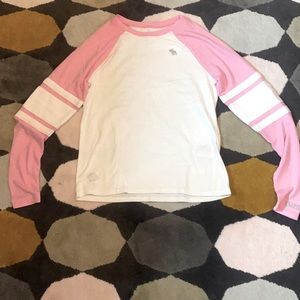 pink and white Abercrombie kids long sleeve shirt